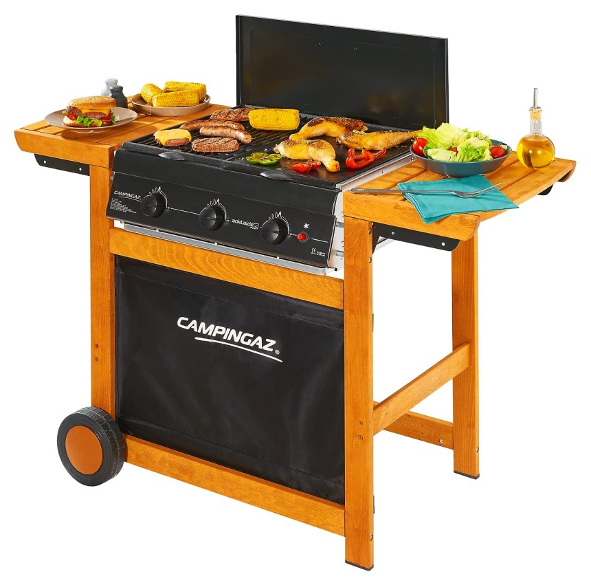 Il barbecue a gas CAMPINGAZ Adelaide 3 Woody ha un'ampia are di cottura di 60 x 46 centimetri, con grigia e piastra entrambe in acciaio, che vi permettono di cucinare carne, pesce e verdure come meglio vi pare